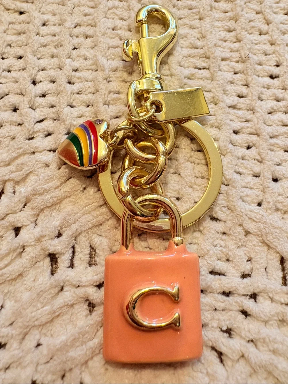 Coach Gold-Tone Keychain with Coral Enamel 'C' Padlock Charm